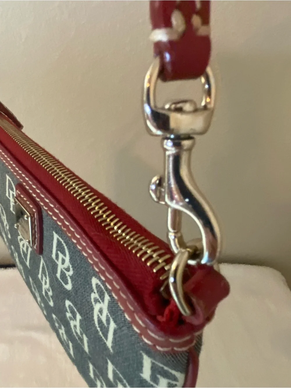 Dooney & Bourke DB Logo Canvas Wristlet with Red Trim and Extender